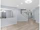 Open floor plan features stairs, neutral walls, and recessed lighting at 1119 Albemarle Cir, Noblesville, IN 46062