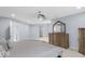 This main bedroom suite features neutral carpet, recessed lighting, and traditional wood furniture at 1119 Albemarle Cir, Noblesville, IN 46062