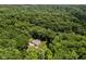 An aerial view of a home surrounded by dense trees providing a private, secluded location at 1125 Observatory Rd, Martinsville, IN 46151