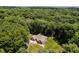 An aerial view of a home surrounded by dense trees providing a private, secluded location at 1125 Observatory Rd, Martinsville, IN 46151