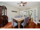 Traditional dining room featuring wood floors, elegant furnishings and plenty of natural light at 1125 Observatory Rd, Martinsville, IN 46151