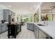 Large open concept kitchen with stainless steel appliances, white countertops and breakfast area at 1125 Observatory Rd, Martinsville, IN 46151