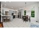 Spacious kitchen with modern stainless steel appliances, breakfast bar, and a bright dining area at 1125 Observatory Rd, Martinsville, IN 46151