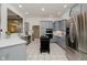 Open concept kitchen with stainless appliances, kitchen island and plenty of cabinet storage at 1125 Observatory Rd, Martinsville, IN 46151