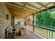 Under-deck featuring wood ceiling and deck, outdoor lighting, lounge seating and a grill area for enjoyment at 1125 Observatory Rd, Martinsville, IN 46151