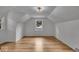 Upstairs bonus room with lots of light and hardwood floors at 1149 E 56Th St, Indianapolis, IN 46220