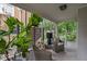 Cozy screened porch with patterned tile, comfortable seating, and garden view at 1149 E 56Th St, Indianapolis, IN 46220