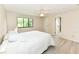Cozy bedroom with a ceiling fan and natural light from a large window at 12020 Colbarn Dr, Fishers, IN 46038