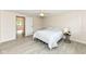 Bedroom with clean walls, white bedding and light coming in through the window at 12020 Colbarn Dr, Fishers, IN 46038