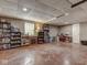 Unfinished basement with neutral paint, drop ceiling, window and generous space for storage at 1225 Berrywood Dr, Greenwood, IN 46143