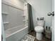 Bathroom with a shower-tub combination, a white toilet and simple, functional fixtures at 1256 Little Rodeo Pl, Greenwood, IN 46143