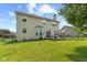 Expansive backyard with a well-maintained lawn and a charming deck, perfect for outdoor relaxation at 1260 Easton Point Dr, Greenwood, IN 46142