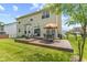 Beautiful backyard features an inviting deck with outdoor seating and a well-maintained lawn at 1260 Easton Point Dr, Greenwood, IN 46142