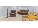 Finished basement with lounge area, casual seating, and a lamp at 1260 Easton Point Dr, Greenwood, IN 46142