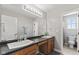 Bright bathroom featuring double sinks, ample counter space, and neutral decor at 1260 Easton Point Dr, Greenwood, IN 46142