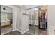 Spacious bathroom with a glass shower and a separate closet for easy storage at 1260 Easton Point Dr, Greenwood, IN 46142