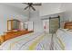 Bright bedroom with a barn door bathroom entrance for additional privacy at 1260 Easton Point Dr, Greenwood, IN 46142