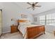 Comfortable bedroom featuring a ceiling fan, natural light, and neutral paint at 1260 Easton Point Dr, Greenwood, IN 46142