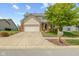 Charming two-story home with a well-manicured lawn, brick accents, and an attached two-car garage at 1260 Easton Point Dr, Greenwood, IN 46142