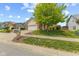 Charming two-story home with a well-manicured lawn, brick accents, and an attached two-car garage at 1260 Easton Point Dr, Greenwood, IN 46142