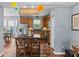 Open kitchen with stainless steel appliances, wooden cabinets, and a center island with seating at 1260 Easton Point Dr, Greenwood, IN 46142