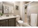 Bathroom with a shower, vanity, and neutral tones creating a clean and modern space at 12922 St Andrews Way, Fishers, IN 46038