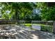 Spacious wooden deck offering an inviting outdoor space for relaxation and entertainment at 12922 St Andrews Way, Fishers, IN 46038