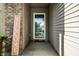 Inviting front porch view featuring a 'Welcome' sign near the front door at 12922 St Andrews Way, Fishers, IN 46038