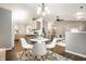 Open-concept living room and dining area showcasing the seamless flow and comfortable design at 12922 St Andrews Way, Fishers, IN 46038