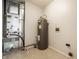Utility room featuring a water heater, HVAC system, and tile flooring at 12922 St Andrews Way, Fishers, IN 46038