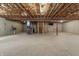 Spacious unfinished basement features utilities, concrete floors and wood ceiling with exposed beams at 13172 Duval Dr, Fishers, IN 46037