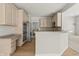 Bright eat-in kitchen area featuring wooden floors, light cabinetry and stainless steel appliances at 13172 Duval Dr, Fishers, IN 46037