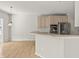 Open eat-in kitchen with bar and stainless steel appliances at 13172 Duval Dr, Fishers, IN 46037