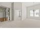 Spacious living room with neutral paint, carpet, high ceilings, and a decorative chandelier at 13172 Duval Dr, Fishers, IN 46037