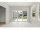Bright sunroom with sliding glass doors and tile floors at 13172 Duval Dr, Fishers, IN 46037