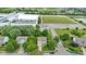 Aerial view of neighborhood featuring a two story house, with trees and other commercial buildings at 14754 Drayton Dr, Noblesville, IN 46062