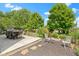 The backyard features a wooden deck and a small seating area with a fire pit at 14754 Drayton Dr, Noblesville, IN 46062