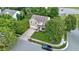 Charming two-story home with a brick facade, well-manicured lawn, mature trees, and a private driveway at 14754 Drayton Dr, Noblesville, IN 46062
