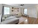 Cozy living room showcasing a large sectional sofa, stylish decor, and ample natural light from nearby windows at 14754 Drayton Dr, Noblesville, IN 46062