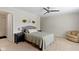 Large bedroom with a ceiling fan, neutral colors, and en suite bathroom at 14754 Drayton Dr, Noblesville, IN 46062