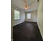 Cozy bedroom with neutral walls, carpeting, and two windows providing natural light at 1738 E 71St St, Indianapolis, IN 46220