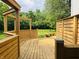 Multi-level deck featuring privacy screens and an open-air pergola overlooking the expansive backyard at 1738 E 71St St, Indianapolis, IN 46220