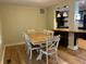 Cozy dining room featuring a rustic table, and stylish lighting that complements the modern kitchen at 1738 E 71St St, Indianapolis, IN 46220