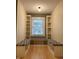 Charming window reading nook with built-in shelving on either side at 1738 E 71St St, Indianapolis, IN 46220