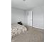 Cozy bedroom featuring carpet, neutral paint, and a door leading to another room at 1932 Downey Ln, Greenfield, IN 46140