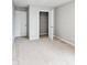 Bedroom featuring neutral walls, carpeted flooring, and a closet with a modern door at 1932 Downey Ln, Greenfield, IN 46140