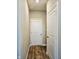 Bright hallway with neutral walls and modern doors, showcasing clean lines at 1932 Downey Ln, Greenfield, IN 46140