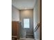 Stairway with carpet steps and neutral paint color, providing access to upper level at 1932 Downey Ln, Greenfield, IN 46140