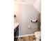 Well-lit bathroom with wood-look flooring and a white toilet located under the sloped ceiling at 2550 Cedarmill Dr, Franklin, IN 46131
