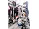 Walk-in closet featuring an organized arrangement of clothing, bags, and exercise equipment at 2550 Cedarmill Dr, Franklin, IN 46131